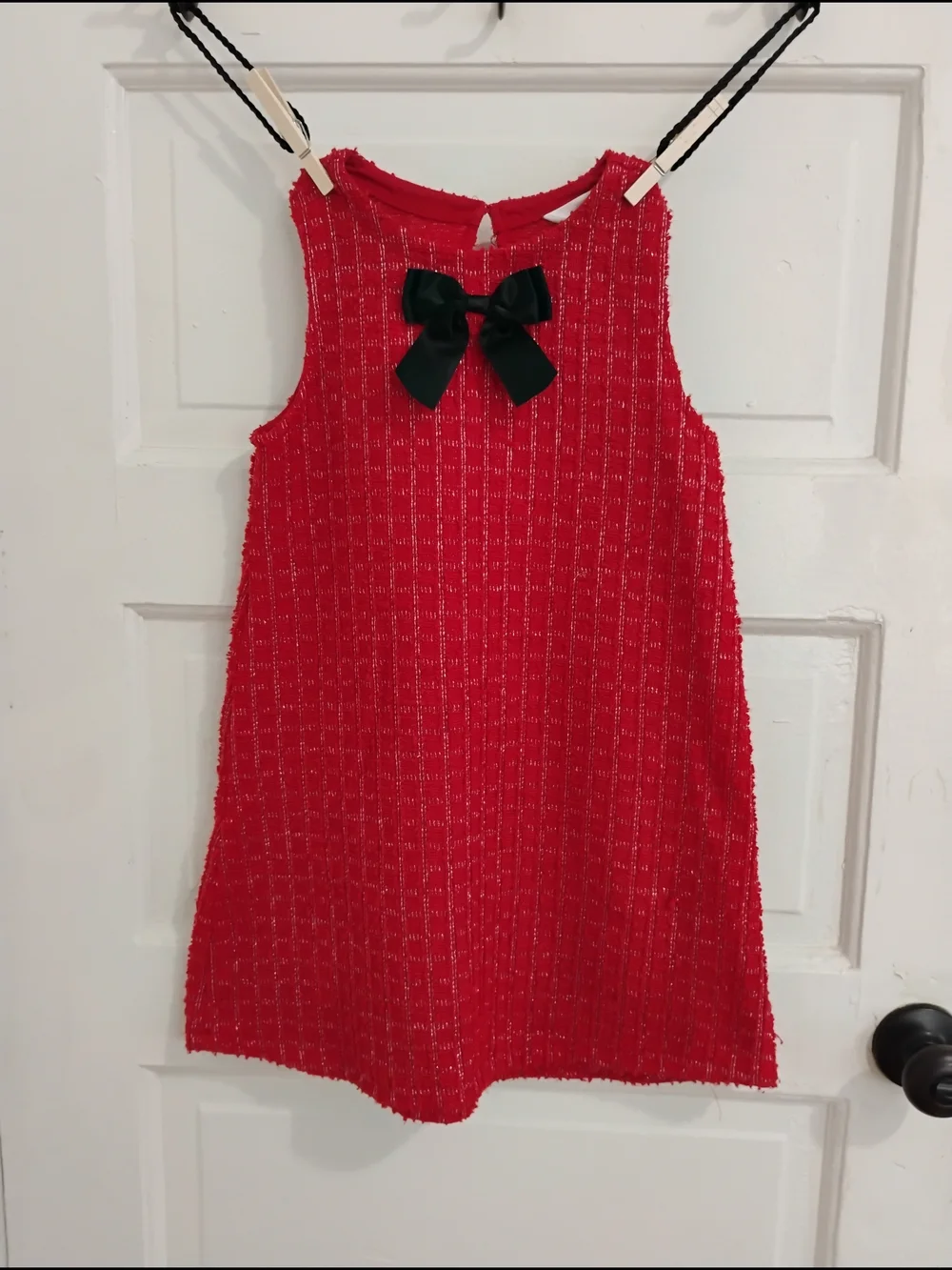 The Perfect Holiday Red Sleeveless Textured Dress with Black Bow